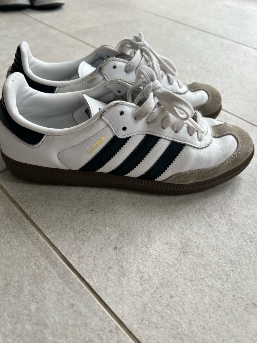adidas White Sneakers with Black Stripes and Brown Sole